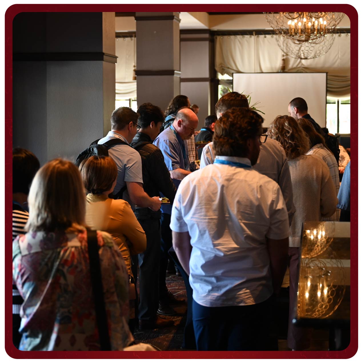 Participants gathering for a buffet meal 