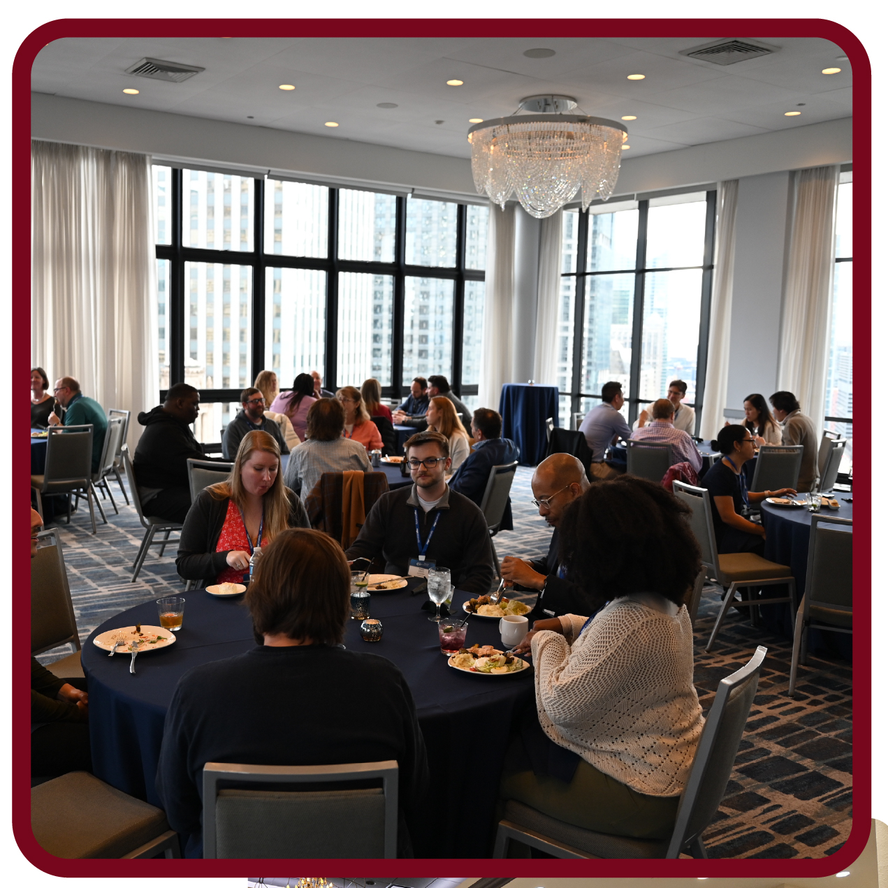 Images-06 Attendees network and share discussions during a Rego University conference meal