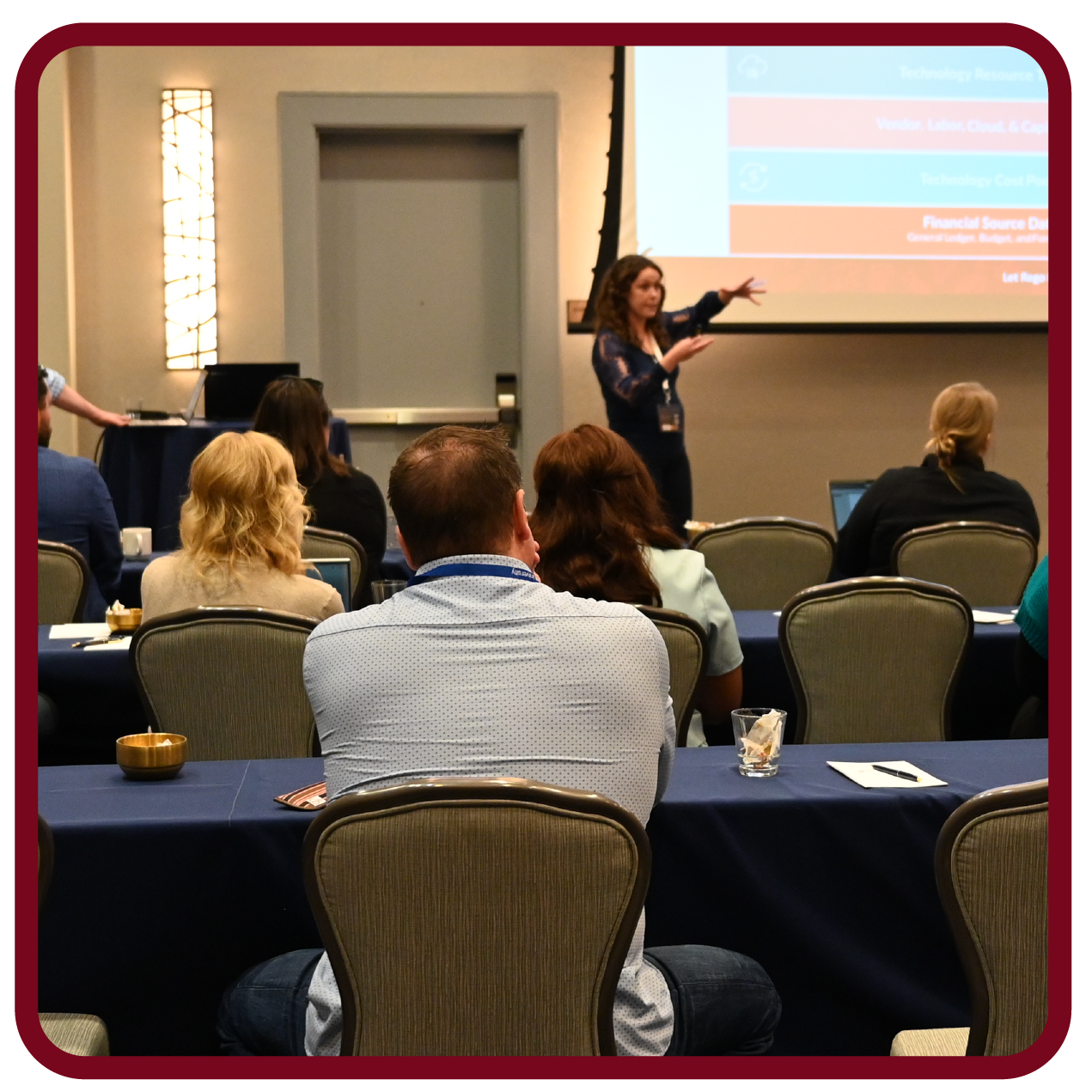 Images-09 Presenter leads a Rego University session while attendees learn practical strategies for technology and portfolio management.