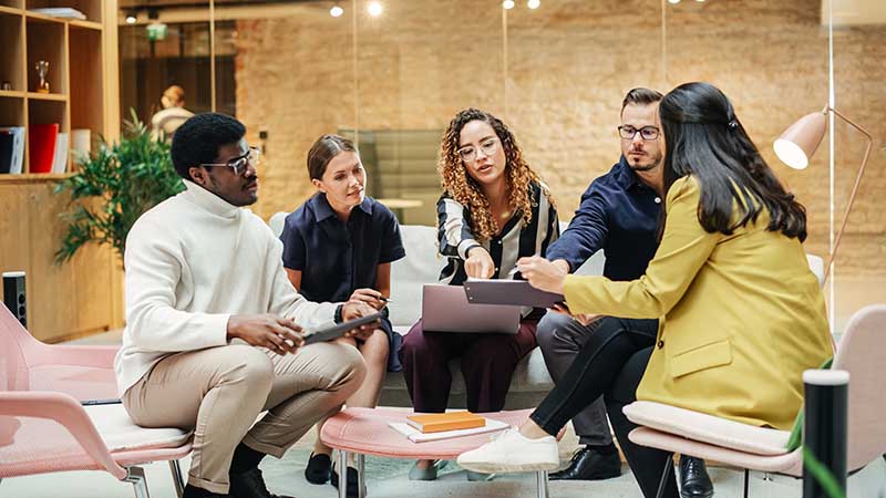 Group of Multiethnic Young People Strategizing in a Conference R